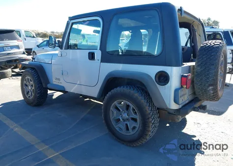 2003 Jeep Wrangler Sport Rhd z USA, uszkodzony, nr VIN 1J4F449S63P359028